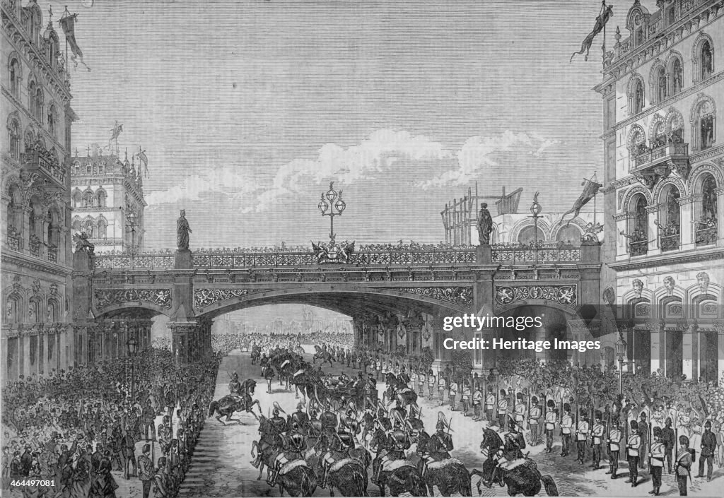 A procession in Farringdon Street passing under Holborn Viaduct, City of London, 1869. Artist: Anon