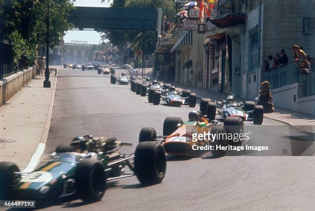 Action from the Monaco Grand Prix, 1968. Jochen Rindt's Brabham-Repco enters a corner ahead of Bruce McLaren's McLaren-Ford. Both drivers crashed out...