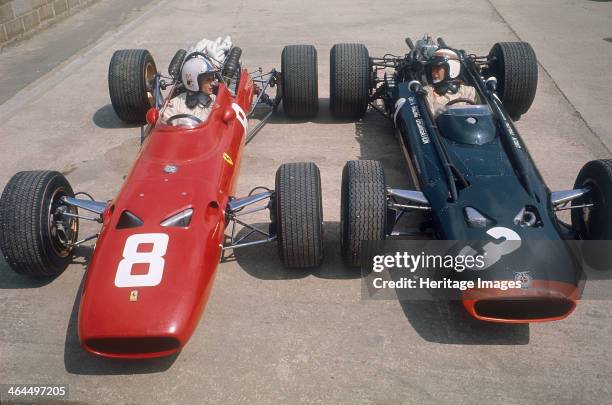 Chris Amon and Jackie Stewart at the British Grand Prix, Silverstone, Northamptonshire, 1967. Amon took third place in his Ferrari, while a...