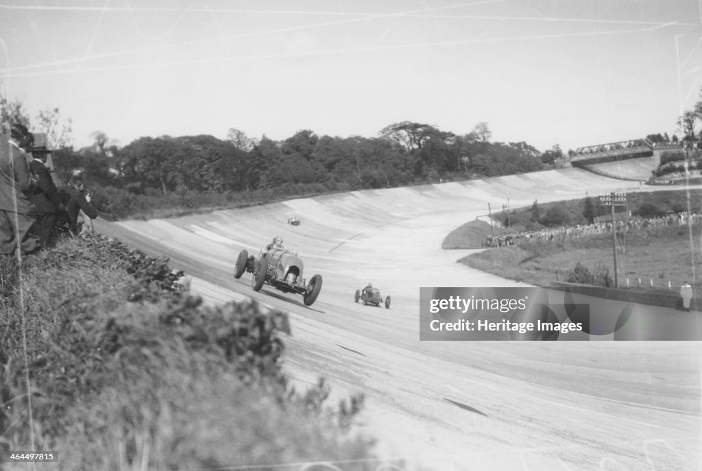 Henry Birkin in a Bentley, Brooklands, Surrey, (c1932?).