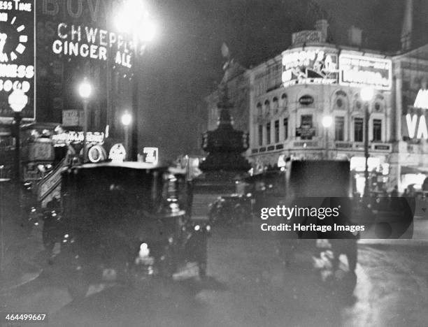 Piccadilly Circus at night, Westminster, London, circa 1925.