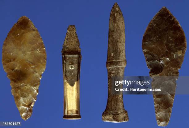 Bronze Age daggers. The central copper dagger, with a reconstructed handle, has been copied in bone and flint. All were dredged from different...