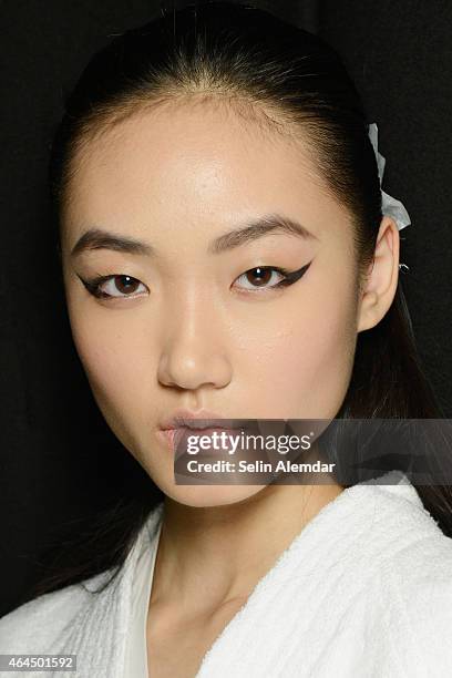 Model is seen backstage ahead of the Anteprima show during the Milan Fashion Week Autumn/Winter 2015 on February 26, 2015 in Milan, Italy.