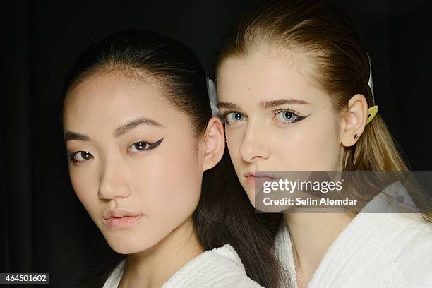 Models pose backstage ahead of the Anteprima show during the Milan Fashion Week Autumn/Winter 2015 on February 26, 2015 in Milan, Italy.