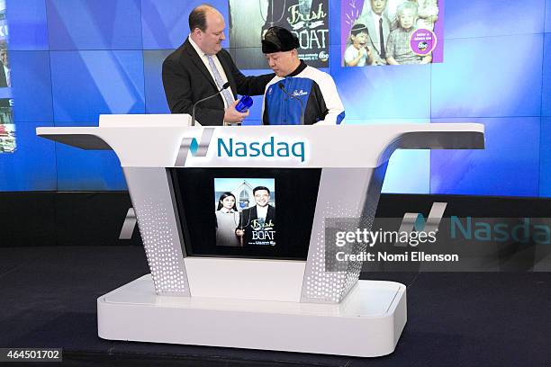 David Wicks and Eddie Huang Ring The NASDAQ Opening Bell at NASDAQ MarketSite on February 26, 2015 in New York City.