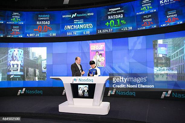 David Wicks and Eddie Huang Ring The NASDAQ Opening Bell at NASDAQ MarketSite on February 26, 2015 in New York City.