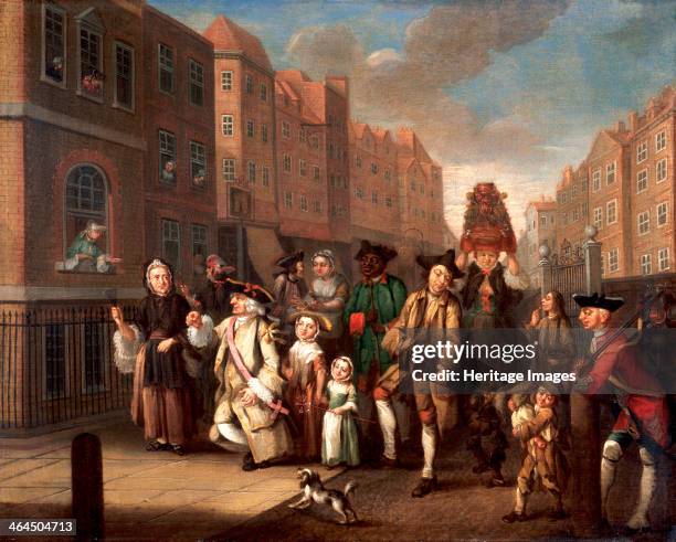 'May Morning', c1760. This painting by John Collet depicts a street scene with a mixed group of people including a chimney sweep, a hurdy-gurdy...