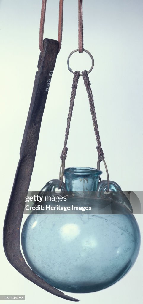 Strigil and flask, Roman.