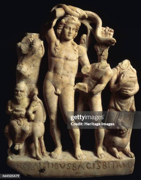 Sculpture depicting Bacchus with Silenus, a satyr, maenad and panther. This sculpture was found on the latest floor of the Temple of Mithras when the...