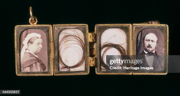 Gold locket said to have been given by Queen Victoria to John Brown, 19th century. Locket with portraits of the queen and Prince Albert, and two...