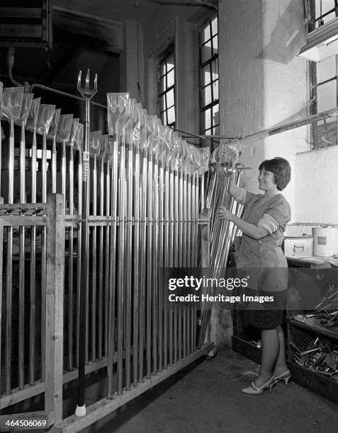 Packing garden forks for dispatch, Brades Tools, Sheffield, South Yorkshire, 1966.