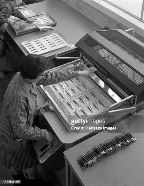 Packing punches, Footprint Tools, Sheffield, South Yorkshire, 1968.