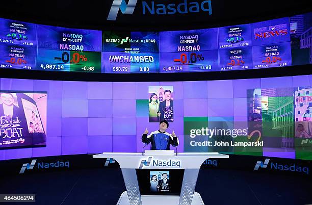 Eddie Huang rings the NASDAQ opening bell at NASDAQ MarketSite on February 26, 2015 in New York City.