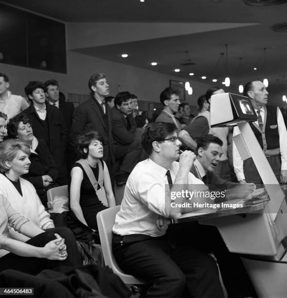 Steelworks social evening at a bowling alley, Sheffield, South Yorkshire, 1964. Employees of the Edgar Allen steel foundry in Sheffield on a social...