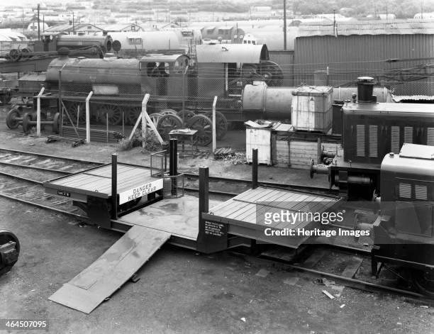 Laycock Engineering rail mounted loadlifta, Bicester sidings, Oxfordshire, 1959. As the age of steam came to an end, some locos can be seen in the...
