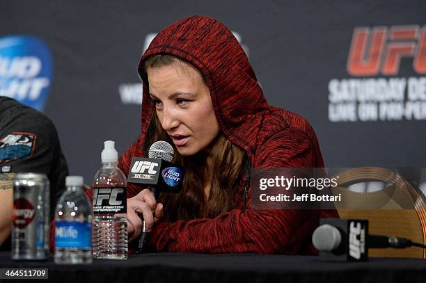 Miesha Tate answers questions from the media at the UFC 168 post fight press conference at the MGM Grand Garden Arena on December 28, 2013 in Las...