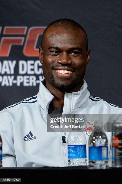 Uriah Hall smiles on stage at the UFC 168 post fight press conference at the MGM Grand Garden Arena on December 28, 2013 in Las Vegas, Nevada.