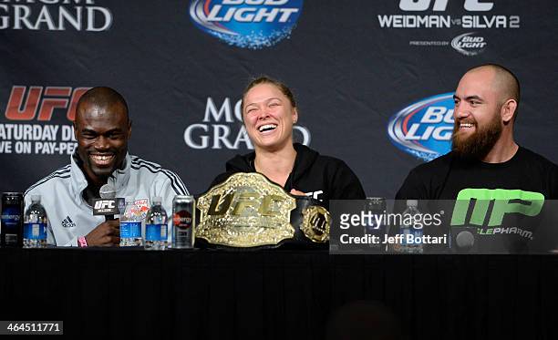 Uriah Hall, Ronda Rousey and Travis Browne share a laugh on stage at the UFC 168 post fight press conference at the MGM Grand Garden Arena on...