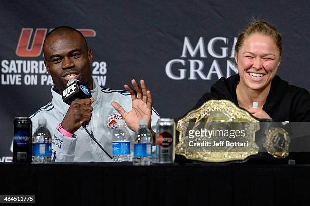 Uriah Hall and Ronda Rousey share a laugh on stage at the UFC 168 post fight press conference at the MGM Grand Garden Arena on December 28, 2013 in...