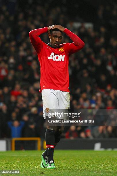 Danny Welbeck of Manchester United reacts after missing with his penalty attempt during the Capital One Cup semi final, second leg match between...