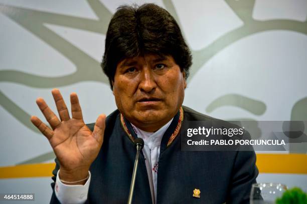 Bolivia's President Evo Morales speaks with journalists after signing agreements with his Uruguayan counterpart Jose Mujica in Montevideo on February...