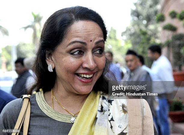 Hema Malini comes out after the presentation of Railway Budget at Parliament House during the Budget Session on February 26, 2015 in New Delhi,...