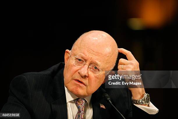 James Clapper, Director of National Intelligence, testifies during a Senate Armed Services Committee meeting at the Dirksen Senate Office Building on...