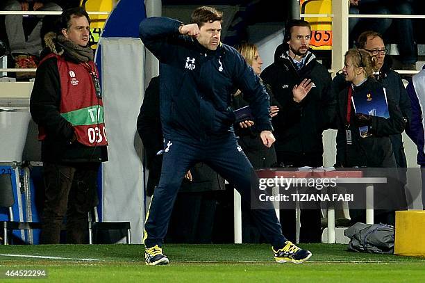 Tottenham Hotspur's Argentinian Head Coach Mauricio Pochettino reacts during the UEFA Europa League round of 32 second-leg football match between...