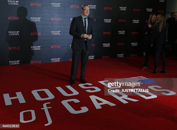 Actor Kevin Spacey poses for photographers on the red carpet ahead of the world premiere of the television series 'House of Cards - Season 3 Episode...