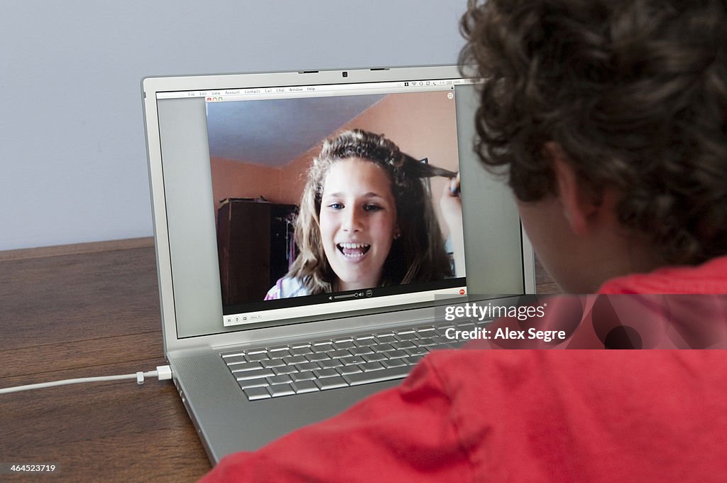 Teenagers talking via video call