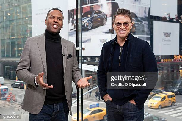 Calloway interviews Tim Daly during his visit to "Extra" at their New York studios at H&M in Times Square on February 26, 2015 in New York City.