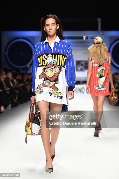 Model walks the runway at the Moschino show during the Milan Fashion Week Autumn/Winter 2015 on February 26, 2015 in Milan, Italy.