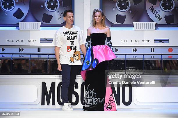 Designer Jeremy Scott acknowledges the applause of the audience after the Moschino show during the Milan Fashion Week Autumn/Winter 2015 on February...