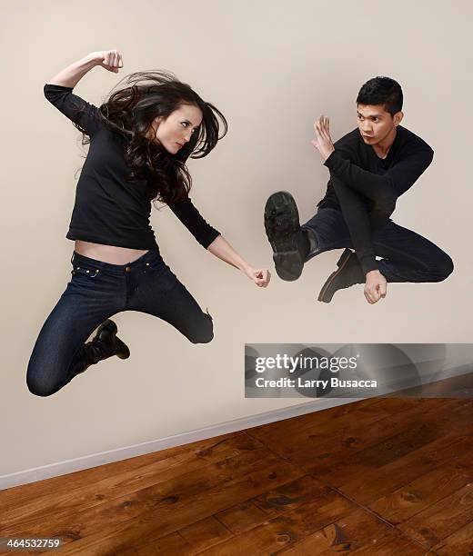 Actors Julie Estelle and Iko Uwais pose for a portrait during the 2014 Sundance Film Festival at the Getty Images Portrait Studio at the Village At...