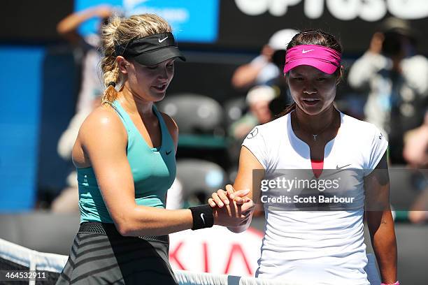 Na Li of China shakes hands with Eugenie Bouchard of Canada after Li won their semifinal match during day 11 of the 2014 Australian Open at Melbourne...