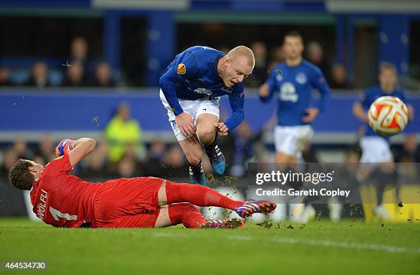 Steven Naismith of Everton is fouled by goalkeeper Marco Wolfli of BSC Young Boys to win a penalty during the UEFA Europa League Round of 32 match...