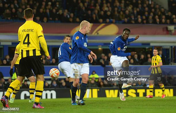 Romelu Lukaku of Everton scores their second goal during the UEFA Europa League Round of 32 match between Everton FC and BSC Young Boys at Goodison...
