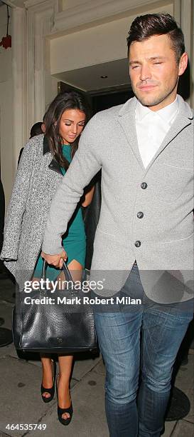 Michelle Keegan and Mark Wright leaving Libertine night club on January 22, 2014 in London, England.