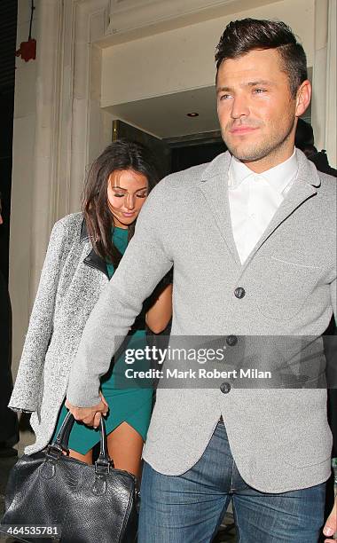 Michelle Keegan and Mark Wright leaving Libertine night club on January 22, 2014 in London, England.