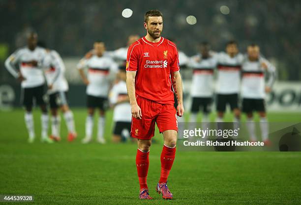 Rickie Lambert of Liverpool walks to take a penalty in the shoot out during the UEFA Europa League Round of 32 second leg match between Besiktas JK...