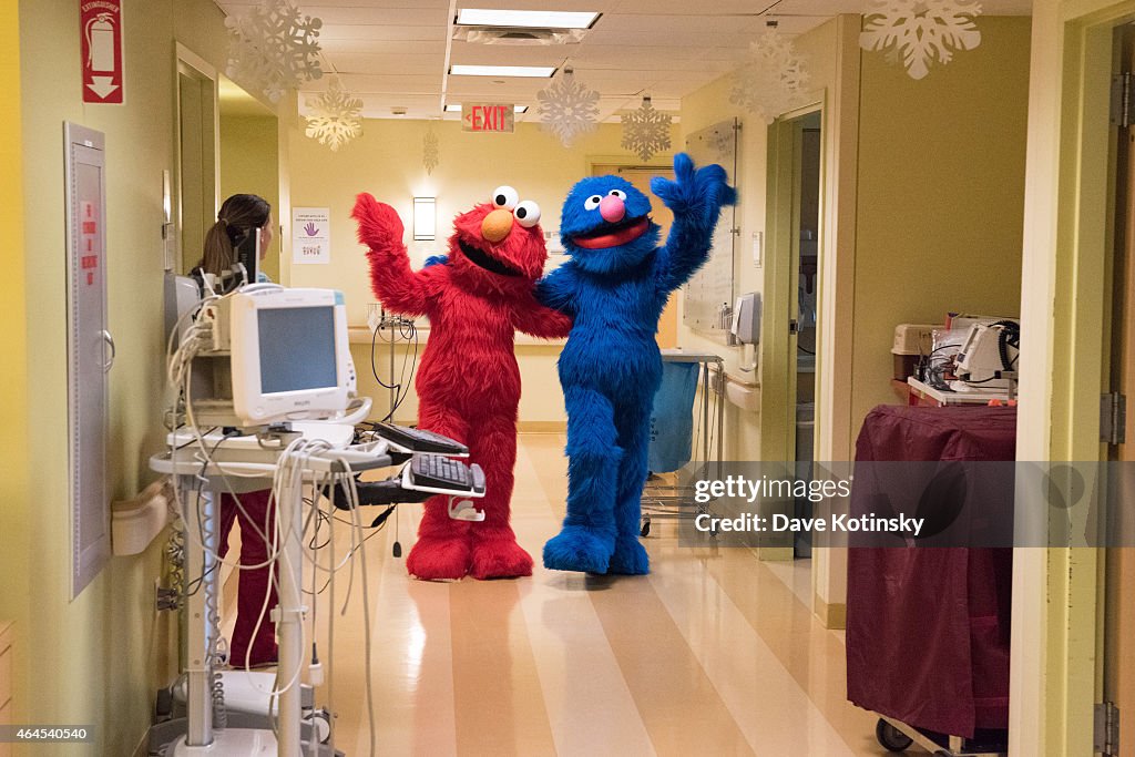 Elmo And Grover Visit Children From The Garden Of Dreams Foundation