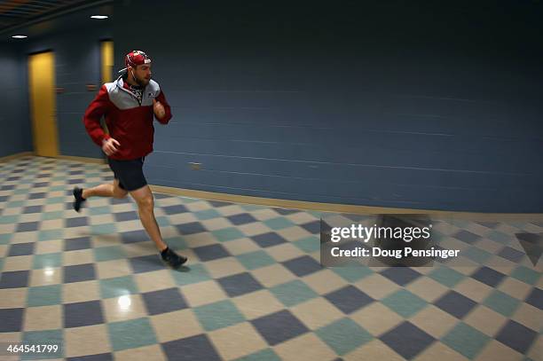 Ryan O'Reilly of the Colorado Avalanche runs in the arena as he warms up prior to facing the Toronto Maple Leafs at Pepsi Center on January 21, 2014...