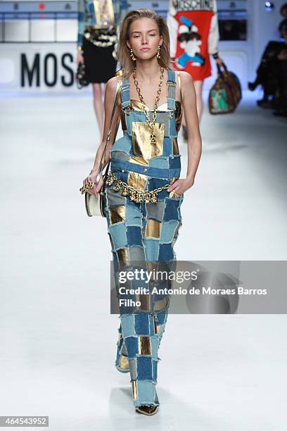 Model walks the runway at the Moschino show during the Milan Fashion Week Autumn/Winter 2015 on February 26, 2015 in Milan, Italy.