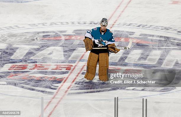 Goaltender Antti Niemi of the San Jose Sharks warms up on the ice before the 2015 Coors Light NHL Stadium Series game against the Los Angeles Kings...