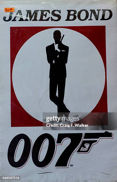 James Bond poster is displayed at Hollywood Posters at his shop on Colfax Ave in Denver, CO February 26, 2015. Owner John Caruso has decided to close...