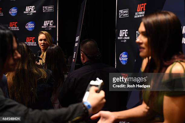 Opponents Ronda Rousey and Cat Zingano interacts with media during the UFC 184 Ultimate Media Day at Club Nokia on February 25, 2015 in Los Angeles,...