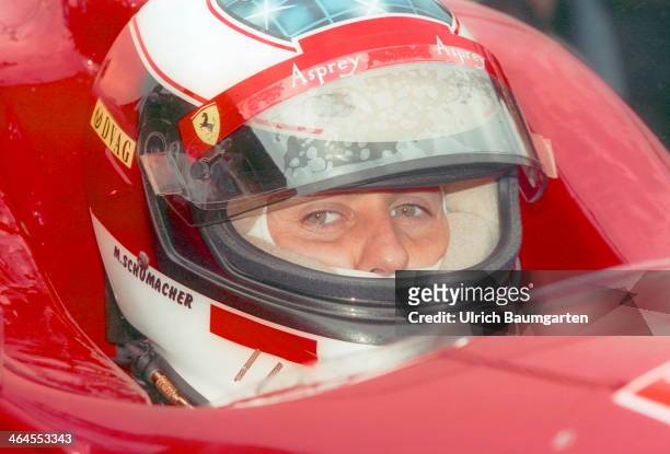 Michael Schumacher with helmet in the cockpit of his race car during Formula 1 Grand Prix at the Hockenheimring on July 28, 1996 in Hockenheimring,...