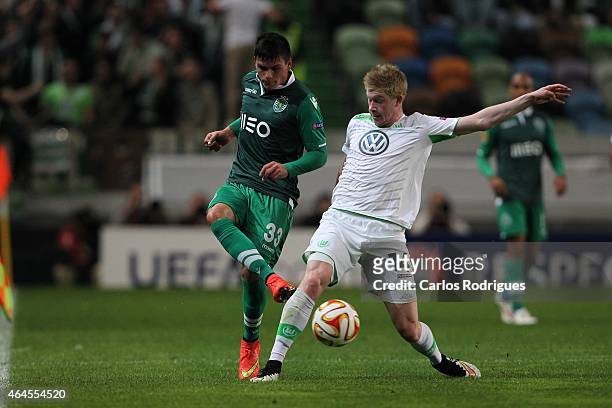 Sporting's defender Jonathan Silva vies with Wolfsburg's midfielder Kevin De Bruyne in action during the UEFA Europa League Round of 32 match between...