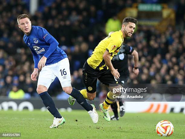 Everton's James McCarthy vies with Leonardo Bertone of BSC Young Boys during the UEFA Europa League round of 32 soccer match between Everton and...