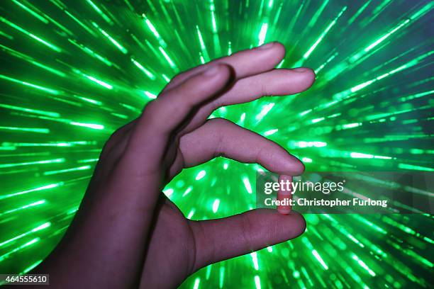 Youth holds a 'Legal High' chemical pill on February 26, 2015 in Manchester, England. There has been a significant rise in the use of Legal Highs...